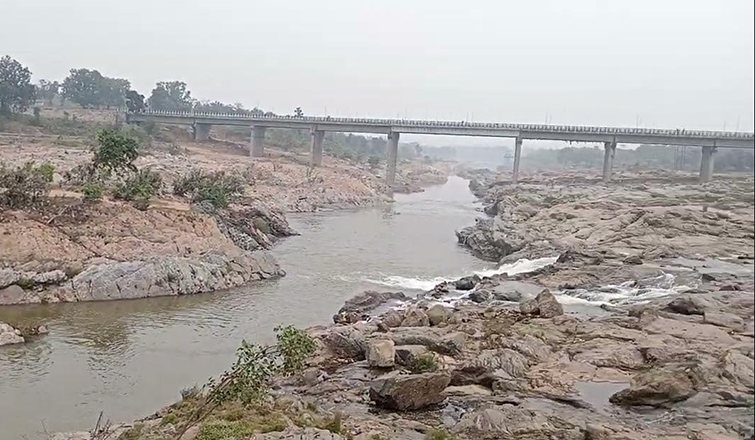 Bridge over a rocky river bed showing linear waterway, pier spacing and scour conditions relevant to IRC 89 and IRC 78